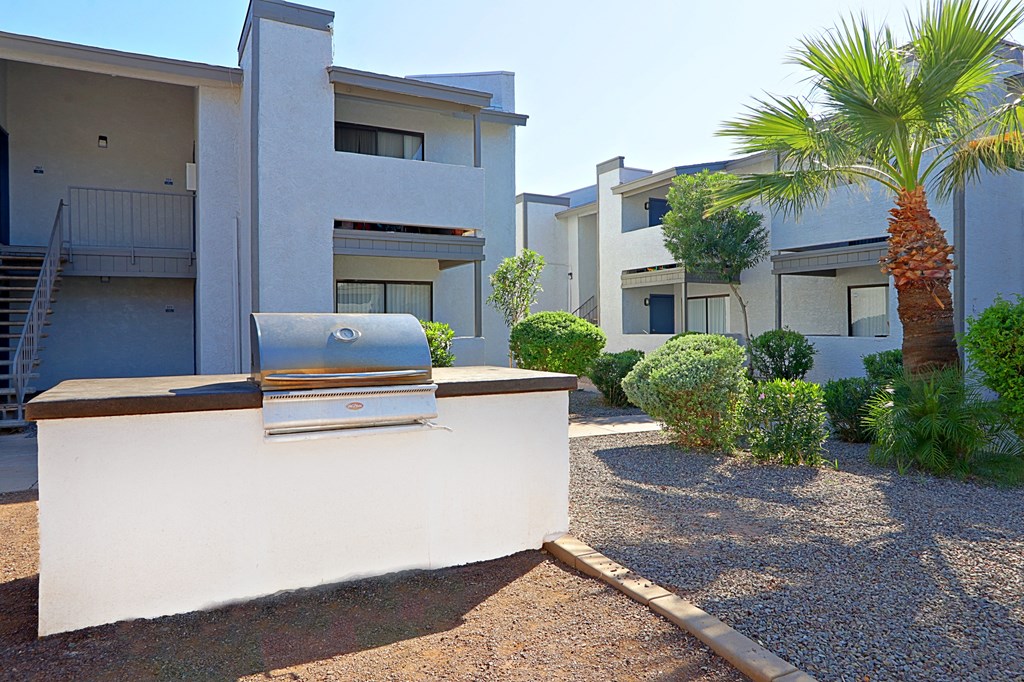 a street view of an apartment complex with a fire hydrant