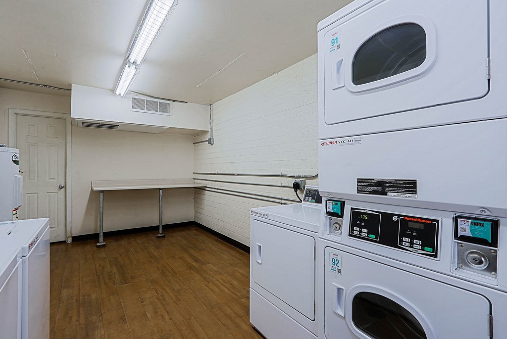 A laundry room with a washer and dryer.