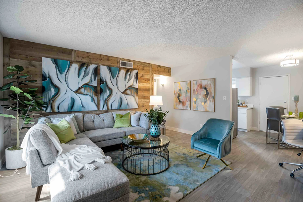 a living room with a couch and a chair