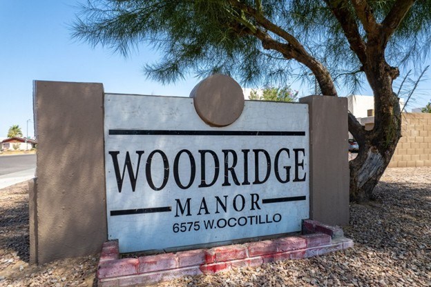 A sign for Woodridge Manor in Wocotillo.