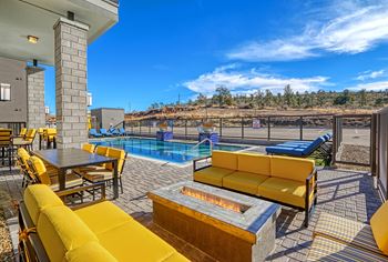 clubhouse with pool and patio furniture at 2051 Apartments, Arizona