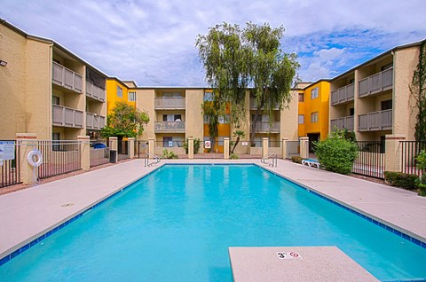 our apartments have a large swimming pool and an apartment building