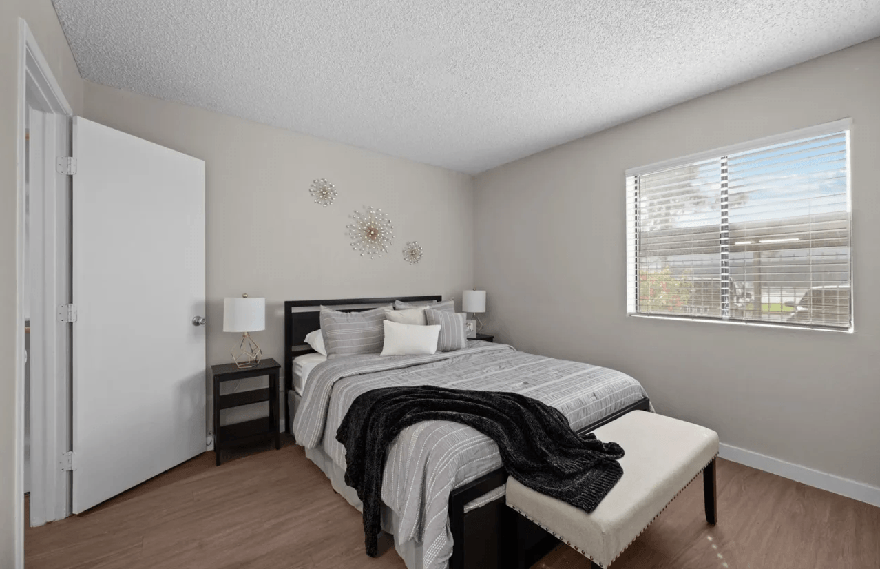 Furnished bedroom shown — representative home at Tides on McDowell.