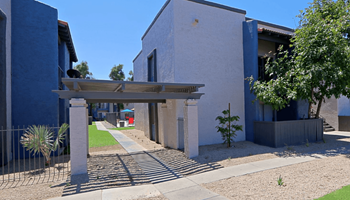 Wood-topped Pergola in front of  manicured grounds at Summers Point in Glendale, Arizona 85301