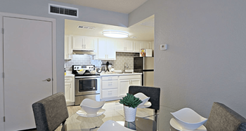 View of Kitchen from the Dining Room with Air Conditioner Vent and Controls on Opposite Walls at Summers Point in Glendale, AZ