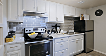 Kitchen with Grey Subwya Tile at Summers Point in Glendale, Arizona 85301