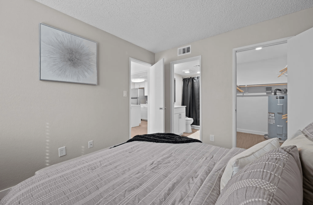 Furnished bedroom shown — representative home at Tides on McDowell.