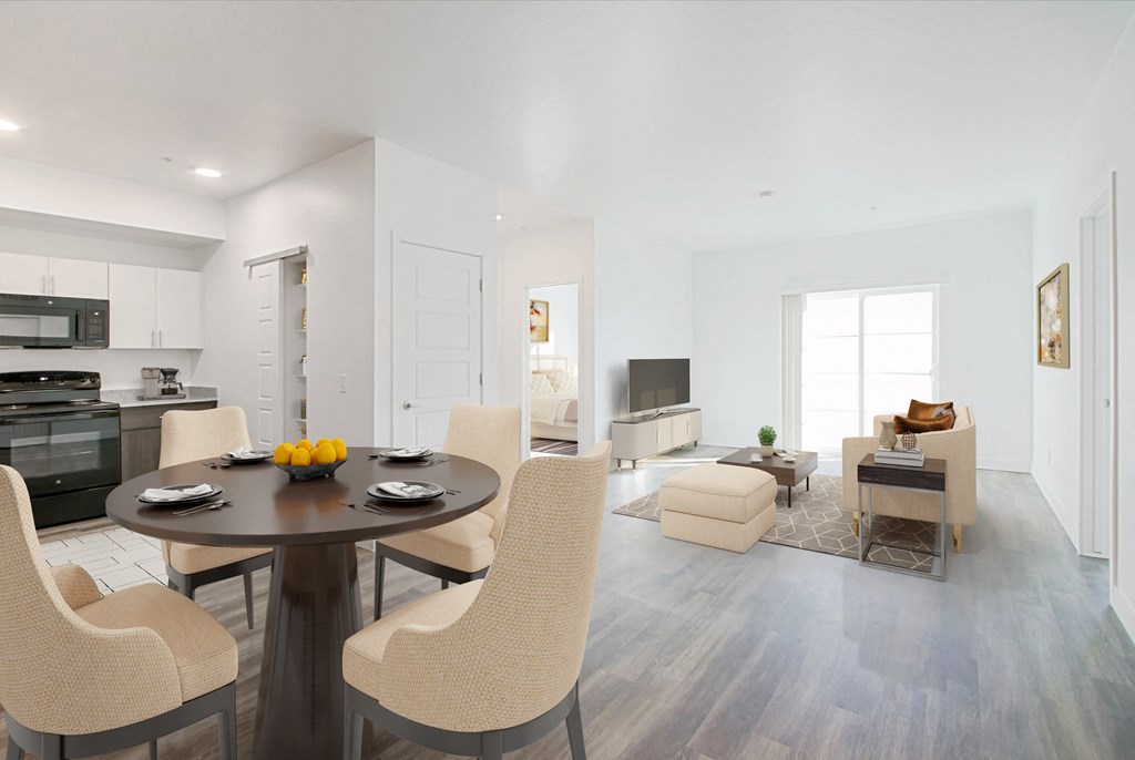 a living room and dining room with white walls and hardwood floors at 2051 Apartments, Prescott, 86301