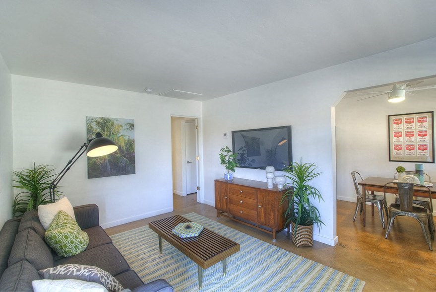 a living room with a couch and a coffee table