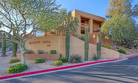 A desert-themed building with a sign that reads Bradshaw Vista 560.
