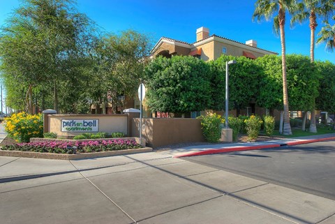 a building with a sign on the side of a street