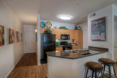 a kitchen with a counter top and a sink
