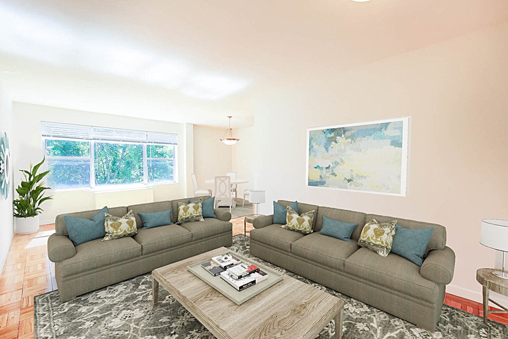living area with sofa, coffee table, hardwood floors and large windows at clarence house apartments in washington dc