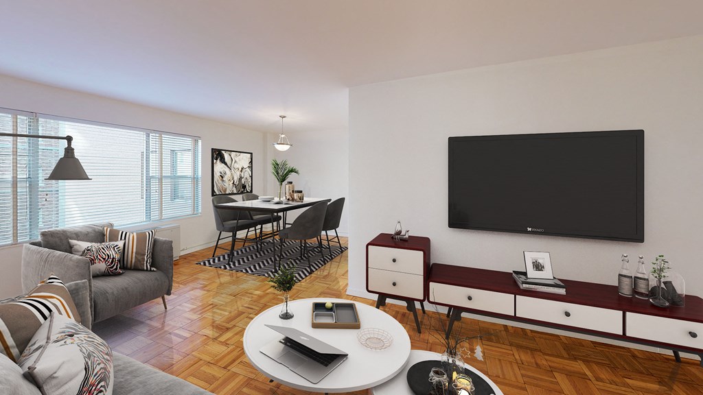 living area with sofa, coffee table, credenza, tv, hardwood floors and view of dining area at clarence house apartments in washington dc