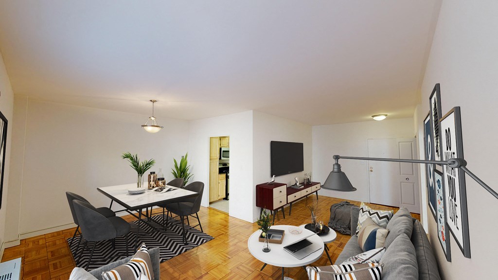 living area with sofa, coffee table, credenza, tv, hardwood floors and view of dining area at clarence house apartments in washington dc
