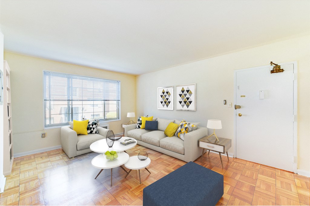 living area with sofa, coffee table, hardwood flooring, and large windows at new horizon apartments in washington dc