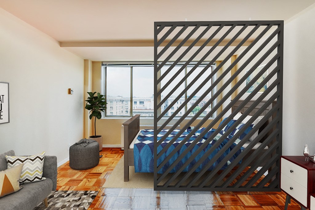 studio apartment showing sofa and bed at brunswick house apartments in dupont circle washington dc