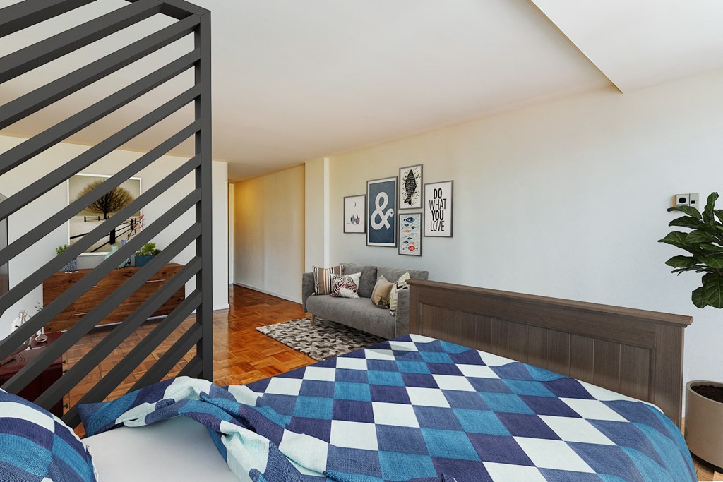 studio apartments showing bed, sofa and front entrance at brunswick house apartments in dupont circle washington dc