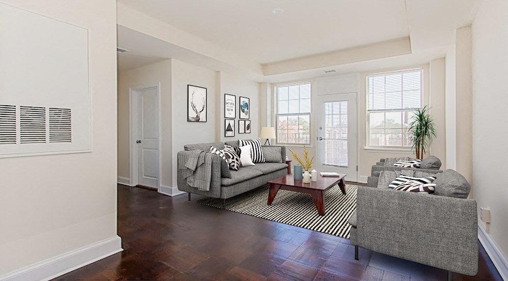 living area with large windows, patio door, sofa, coffee table and hardwood flooring at juniper apartments in washington dc