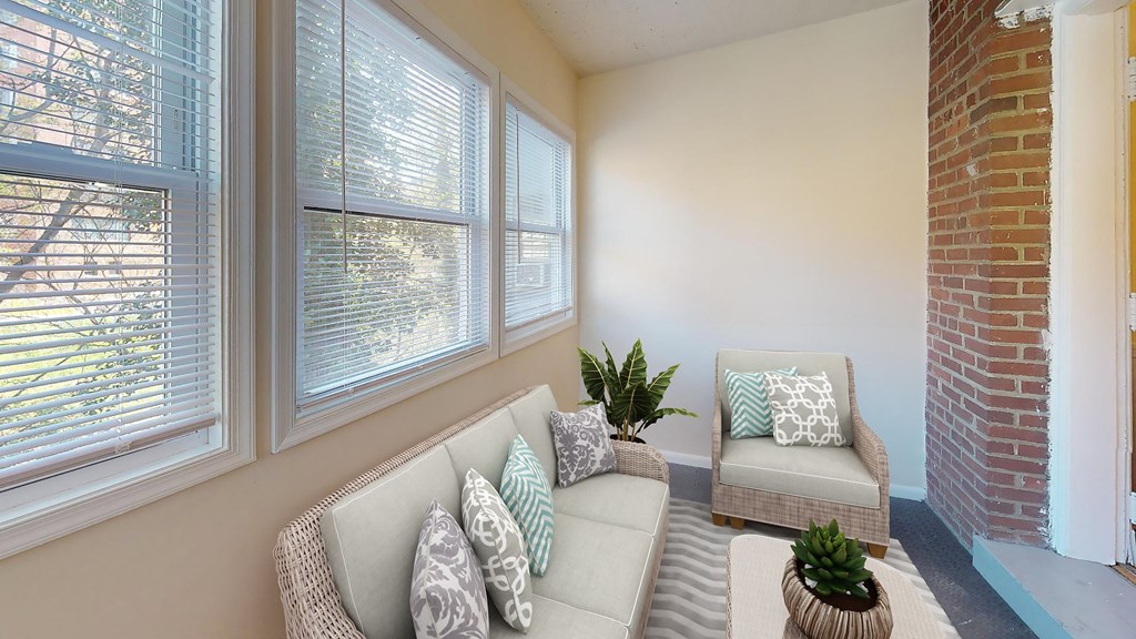 a living room with two couches and a coffee table