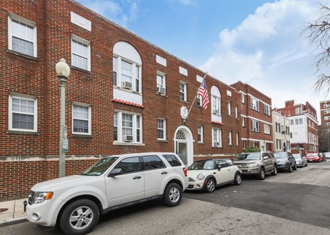 exterior of brick apartments at 1818 riggs place washington dc