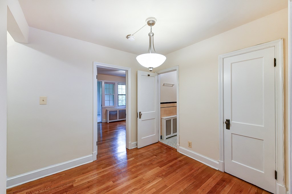 hallway view of living area, bathroom and bedroom at  2629 39th Street apartments in washington dc
