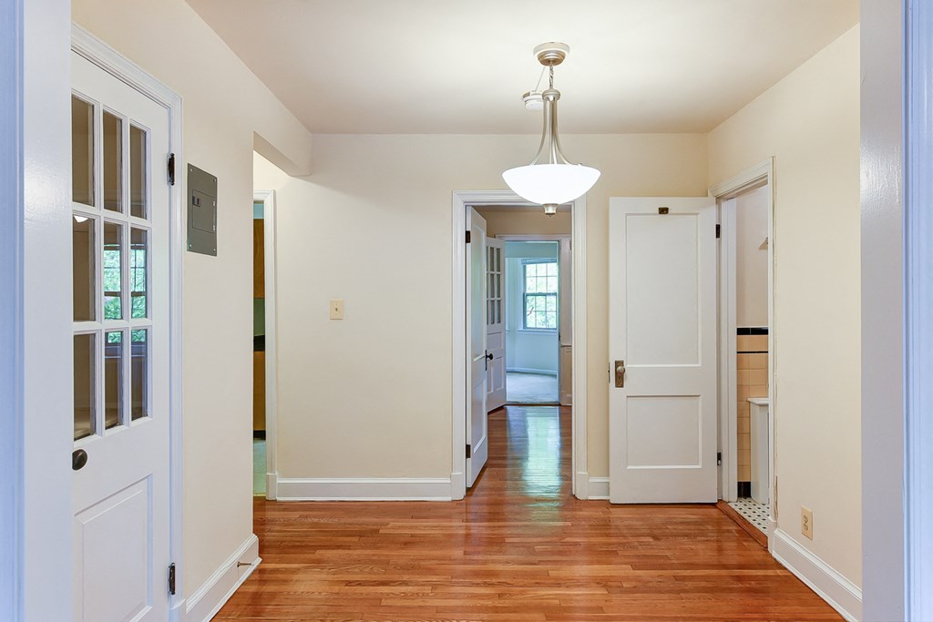 hallway with view of bedroom, sunroom and bathroom at 2629 39th Street apartments in washington dc