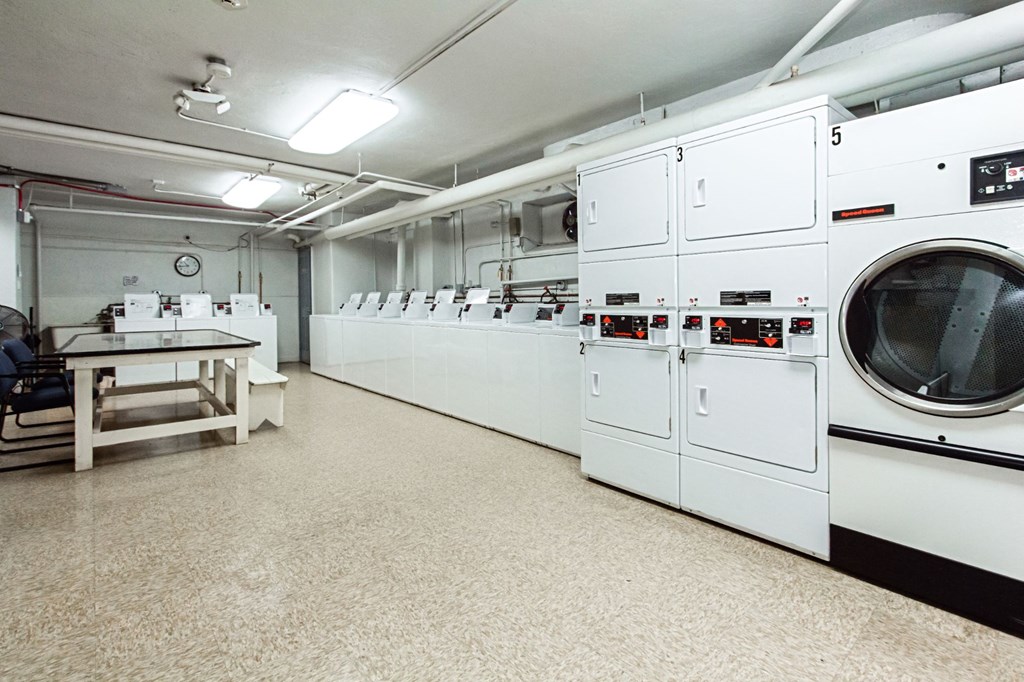 laundry room at 2800 woodley road apartments in washington dc