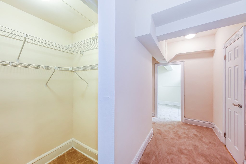 hallway closet with built in shelving at 2800 ontario road apartments in washington dc