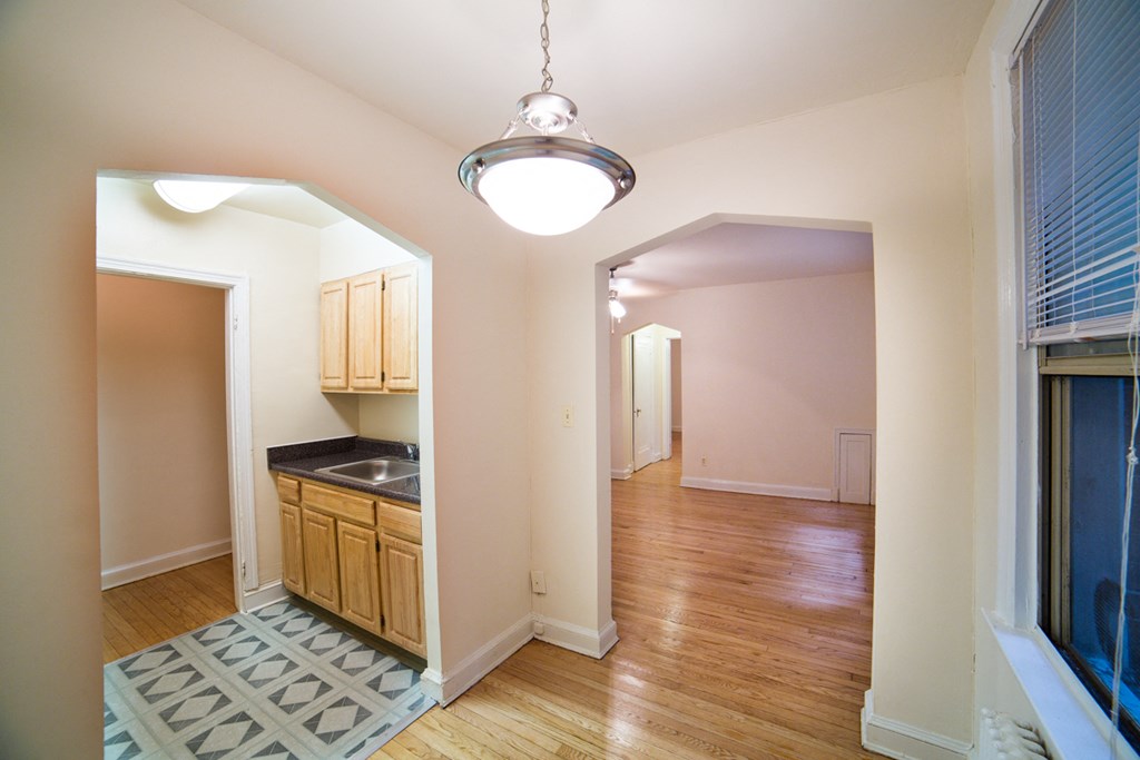 hallway view of living area and kitchen at 3101 pennsylvania apartments in washington dc
