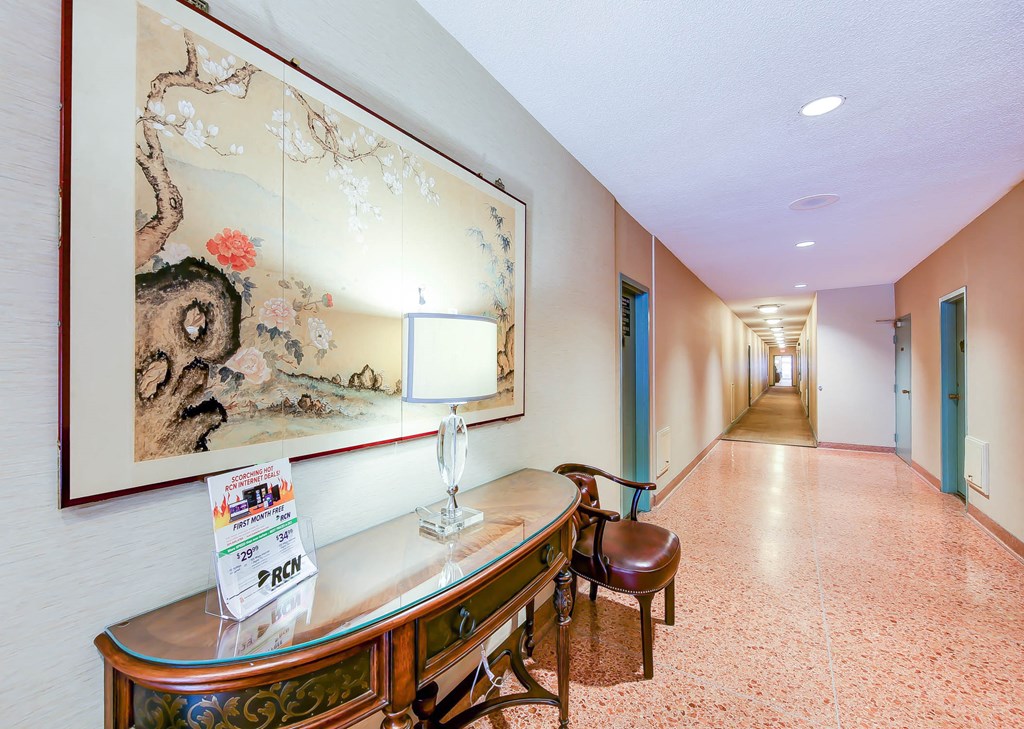 lobby lounge with social seating and modern artwork at clarence house apartments in van ness washington dc