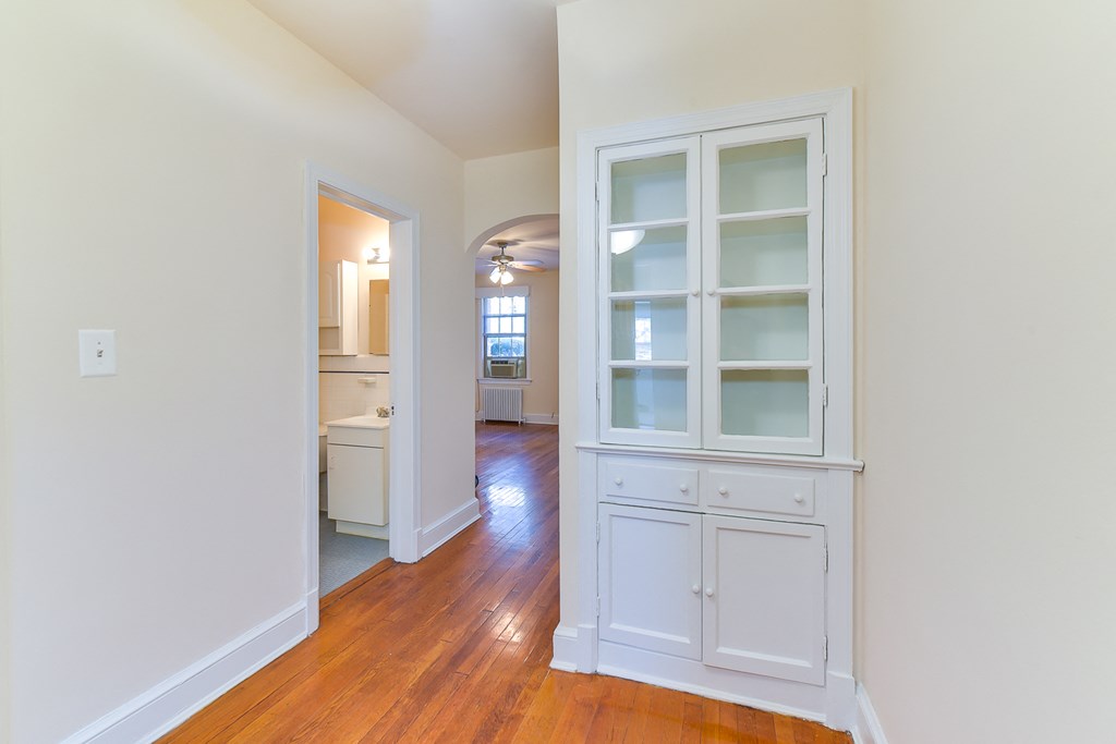 hallway with built in shelving at 4020 calvert street apartments in washington dc
