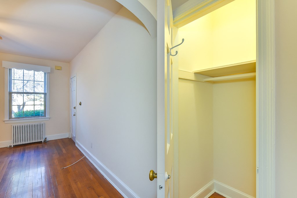 hallway closet with built in shelving at 4020 calvert street apartments in washington dc