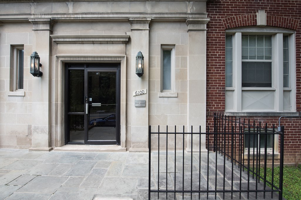 exterior entrance of brick apartment building at 6100 14th street apartments in washington dc