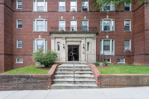 exterior of brick apartment building at 1600 14th street apartments in washington dc