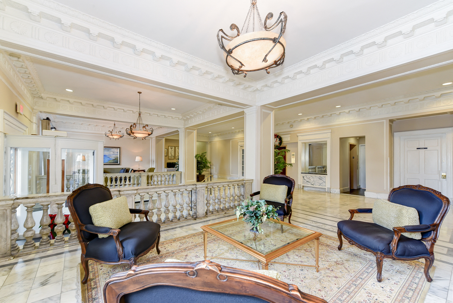 lobby lounge with social seating, marble flooring and elegant lighting at the norwood apartments in adams morgan washington dc