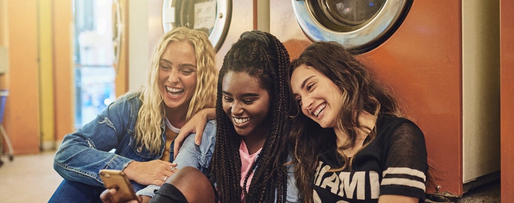 friends at the laundromat