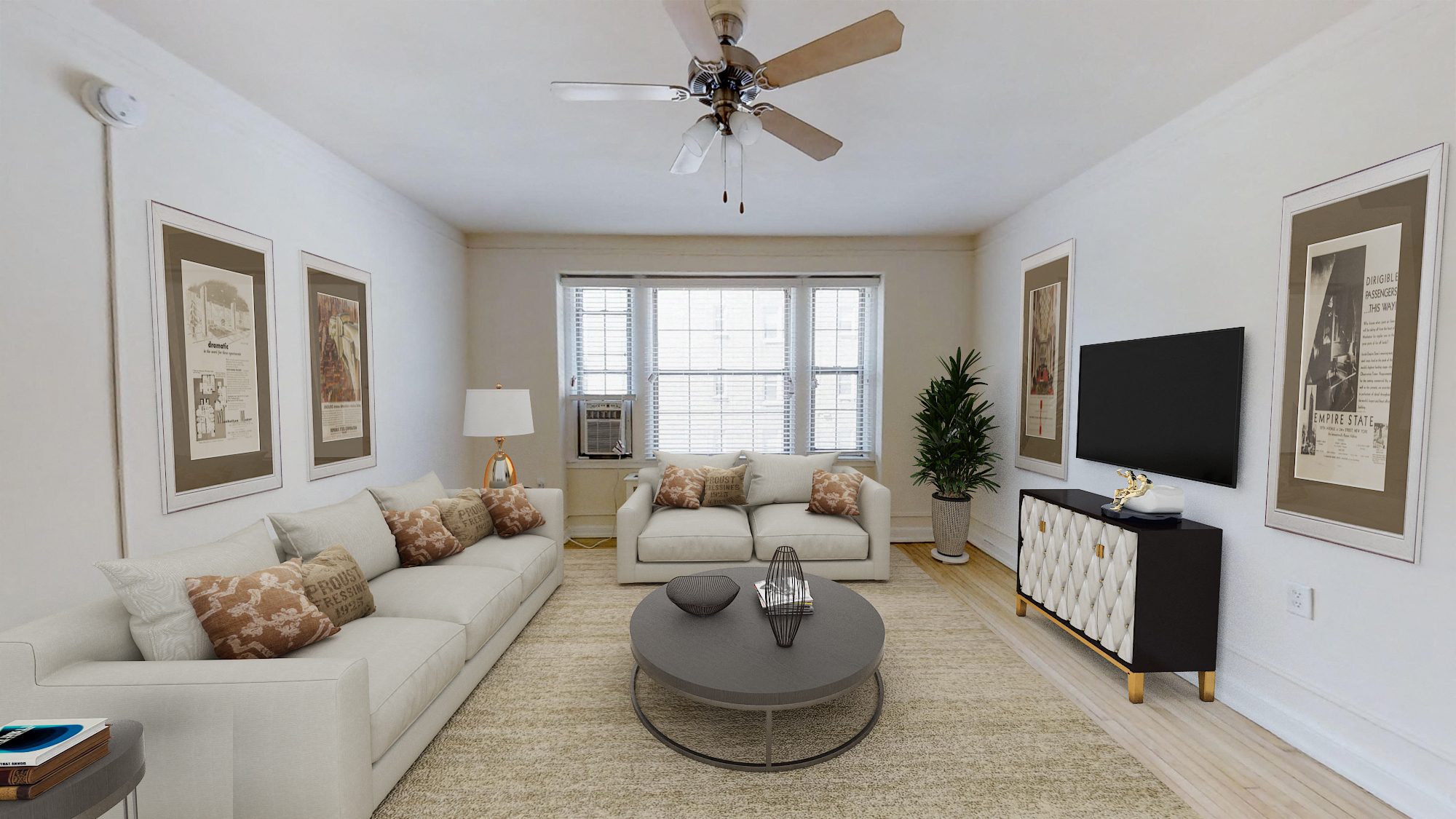 a living room with couches and a coffee table