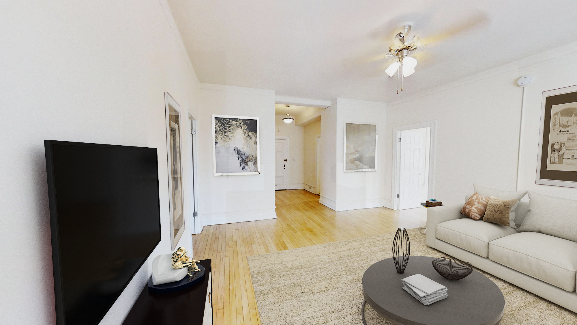 living area with sofa, coffee table, credenza, tv, hardwood floors and ceiling fan at the calverton aparbments in washington dc
