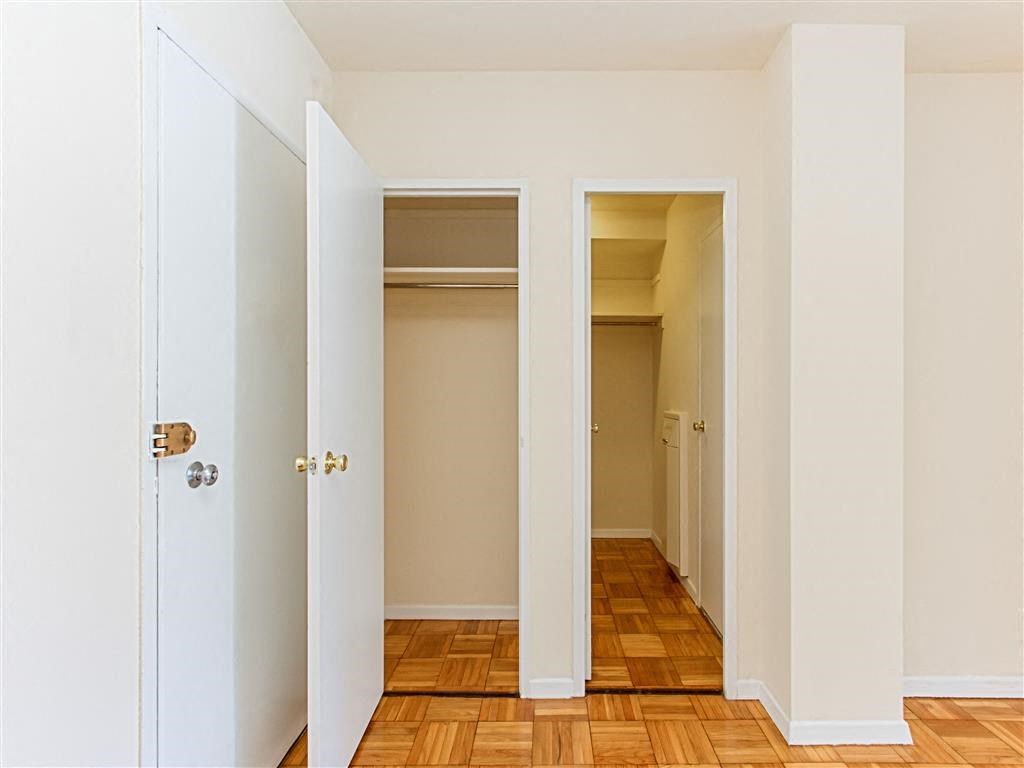 large closets with shelving and hardwood floors at brunswick house apartments in dupont circle washington dc