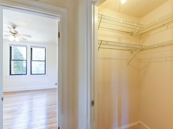 large closet with view of living area at the klingle apartments in washignton dc - Photo Gallery 7