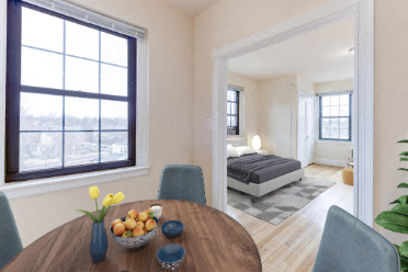 dining  area with table, chairs, large windows and view of bedroom at the dahlia apartments in washington dc