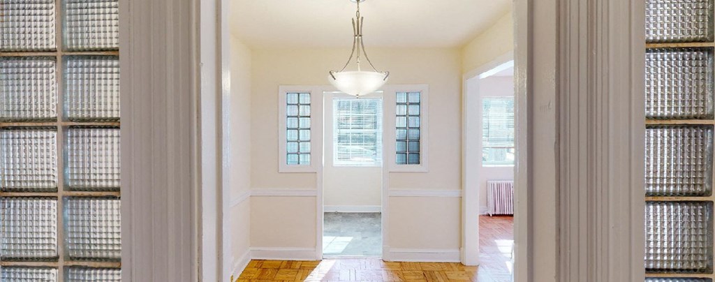 view through hallway to kitchen and living area at 4031 davis in glover park washington dc