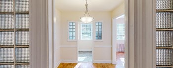 view through hallway to kitchen and living area at 4031 davis in glover park washington dc - Photo Gallery 6