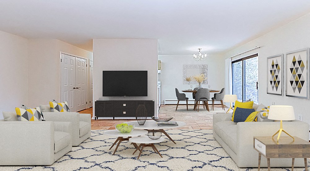 living area with sofa, coffee table, tv, credenza large windows and view of dining area at fort totten apartments in washington dc