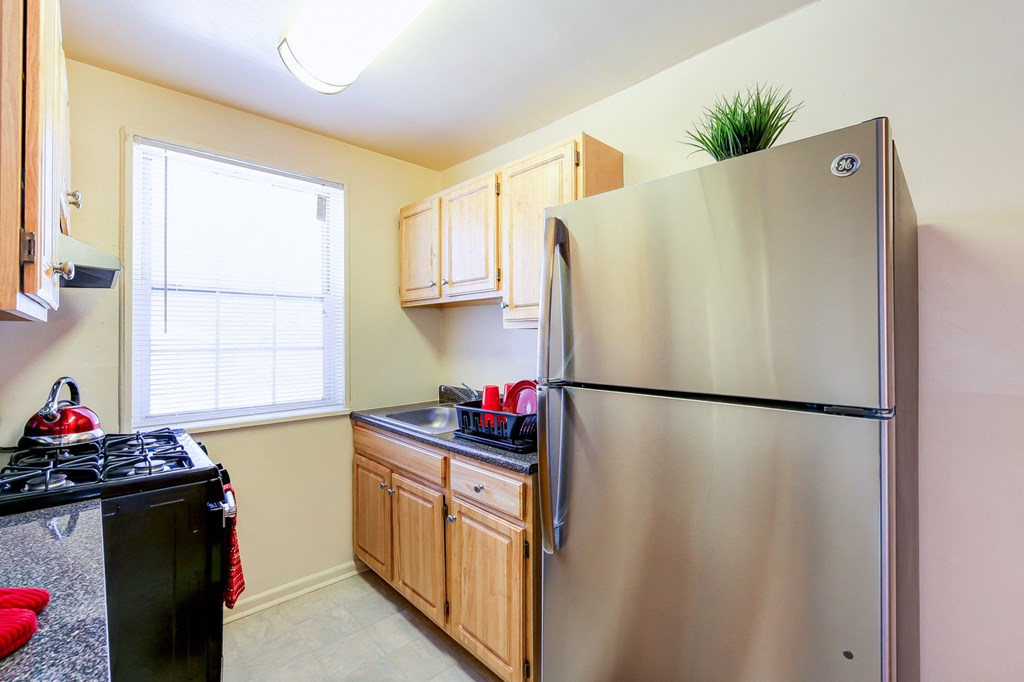 Garden Village tax credit Renovated Kitchen with stainless steel appliances and oak cabinetry in congress heights washington dc