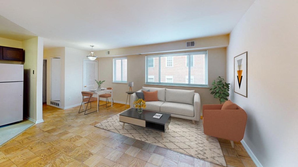 a living room with a couch and a table