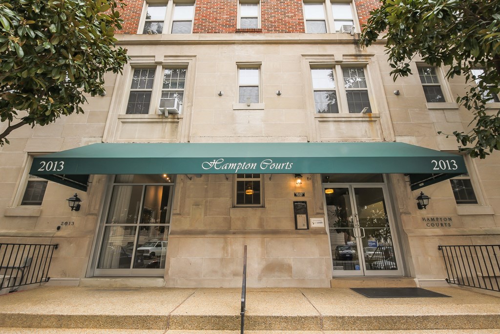 exterior view of hampton courts apartment awning in washington dc