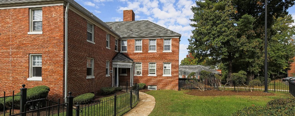 exterior of brick apartment building at hillside terrace apartments in washington dc