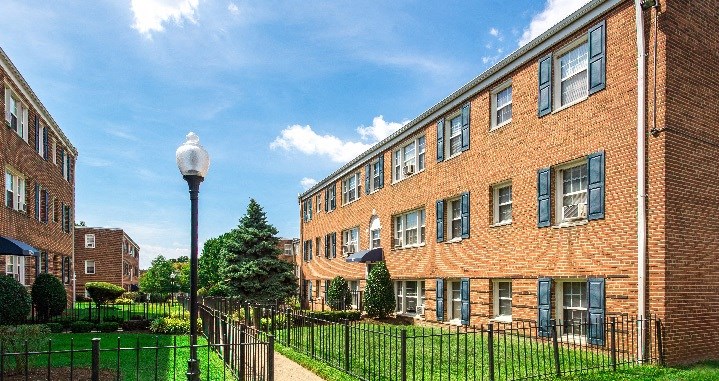 exterior of brick apartment building at jetu apartments in washington dc